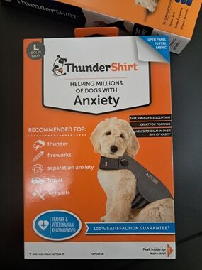 Thundershirt Solid Gray Calming Dog Vest with Orange Packaging Accents